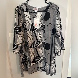 Woman’s sheer, new with tags, top